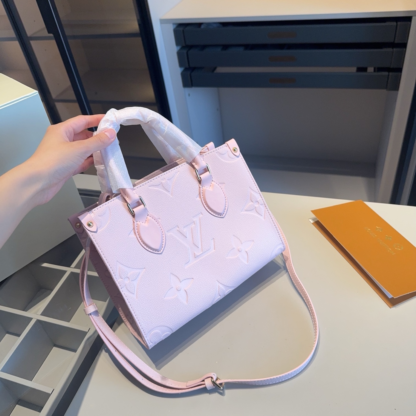 LV OnTheGo Tote in Sakura Pink Embossed Leather – Small & Medium Sizes 25CM/34CM - Image 3