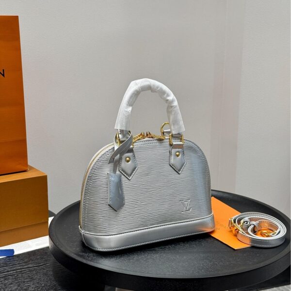 Louis Vuitton Alma Epi Leather Top Handle Bag in Metallic Silver 25CM