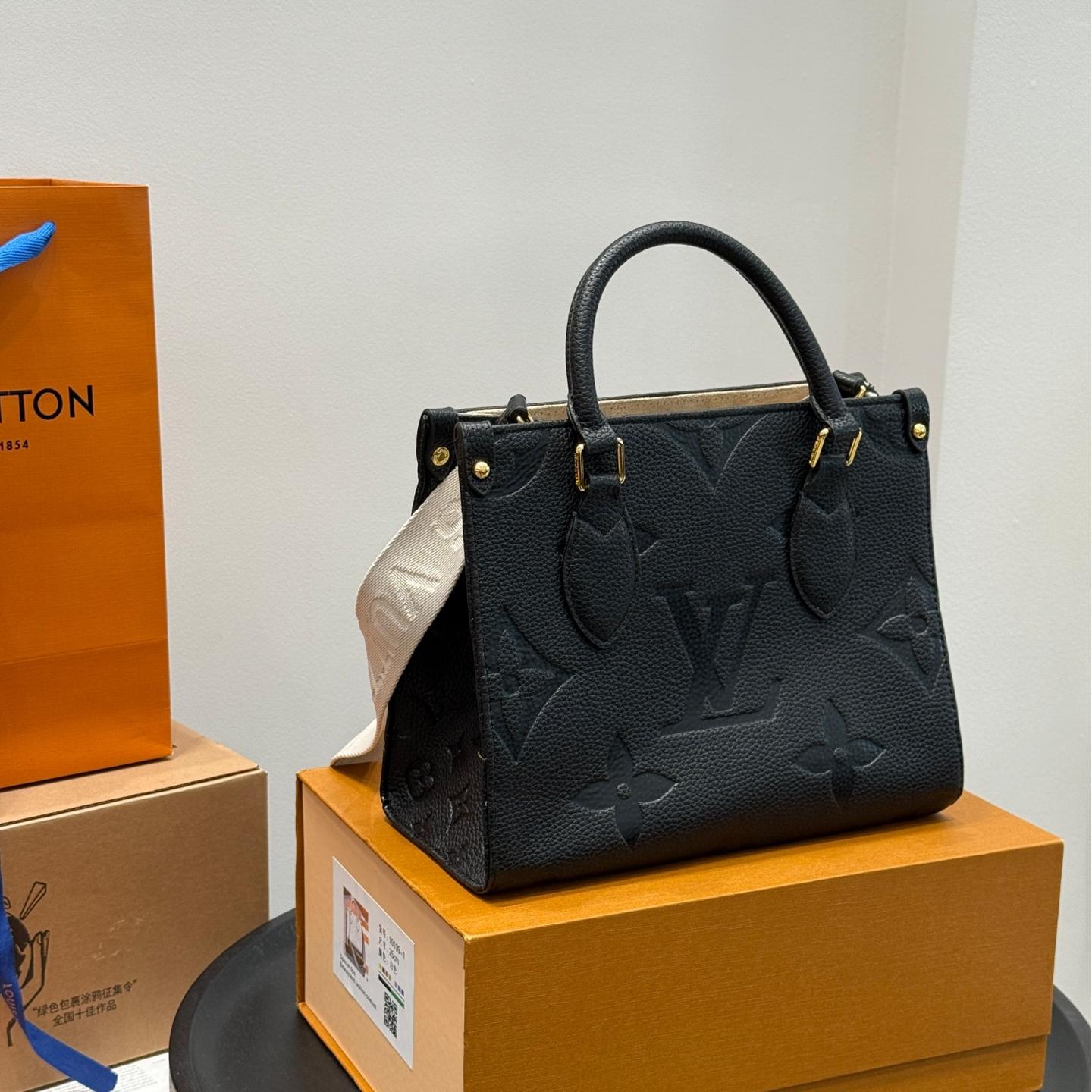 Mini Onthego Tote in Black Monogram Empreinte Leather with Wide Strap & Coin Pouch – 25CM Jungle Edition