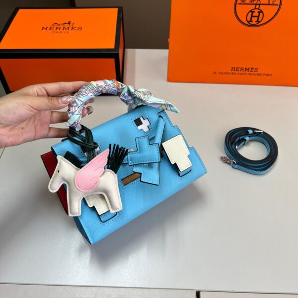 Kelly Doll 19 in Multicolor Picto Calfskin – A Collector’s Charm in Playful Pastel Pop