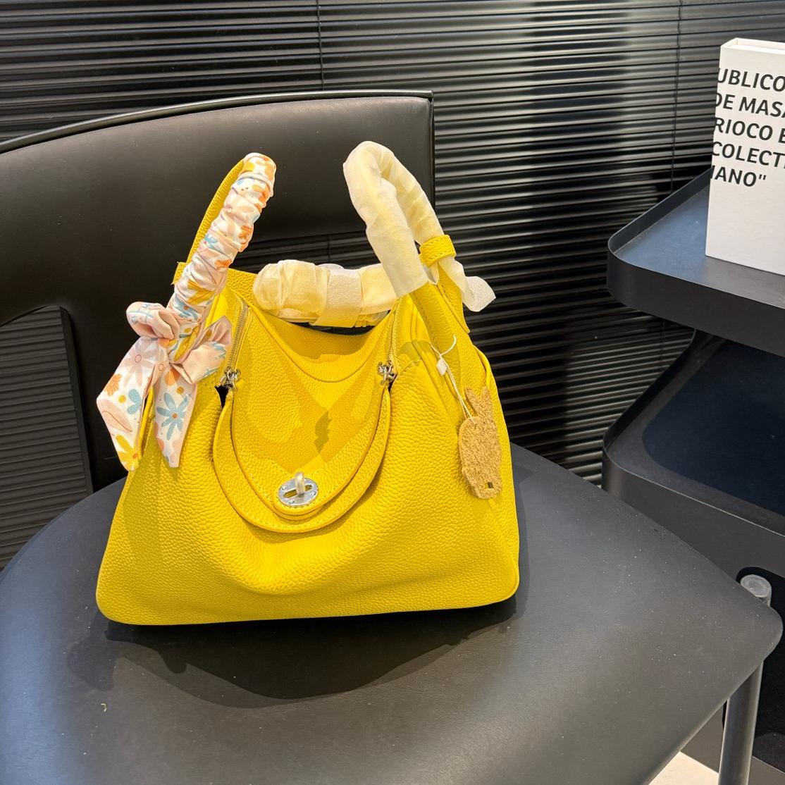 Lindy 19 & 26 in Lemon Yellow Clemence Leather – Youthful Utility with Parisian Ease - Image 2